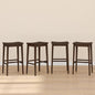 Plank+Beam Smythe Bar Stool, 30", Set of 4, Sturdy Wood Modern Kitchen Bar Height Stool, Saddle Seat Backless Bar Chair, Metal Footrest, Walnut