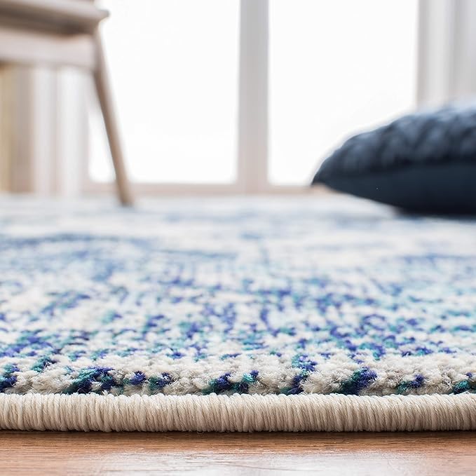 SAFAVIEH Monaco Collection Accent Rug - 4' x 5'7", Ivory & Blue, Boho Medallion Distressed Design, Non-Shedding & Easy Care, Ideal for High Traffic Areas in Entryway, Living Room, Bedroom (MNC243A)