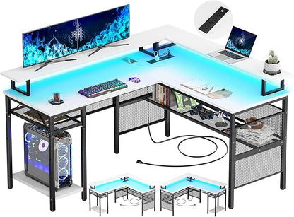 Unikito L-Shaped Desk with LED Strip and Power Outlets, Reversible Corner Computer Desk with Monitor Stand and Storage Shelf, Modern L-Shaped Gaming Table, Home Office Desk with USB Ports, White