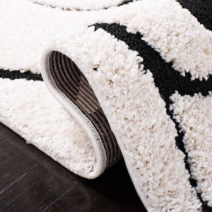 SAFAVIEH Florida Shag Collection Accent Rug - 2'3" x 4', Ivory & Black, Scroll Design, Non-Shedding & Easy Care, 1.2-inch Thick Ideal for High Traffic Areas in Foyer, Living Room, Bedroom (SG455-1290)