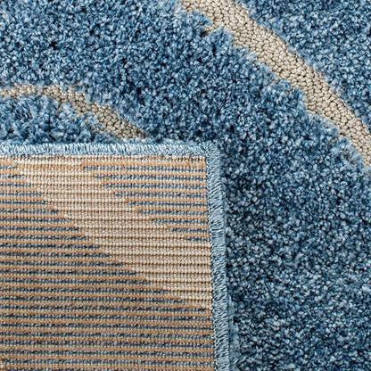 SAFAVIEH Florida Shag Collection Area Rug - 6' x 9', Light Blue & Cream, Scroll Design, Non-Shedding & Easy Care, 1.2-inch Thick Ideal for High Traffic Areas in Living Room, Bedroom (SG455-6011)