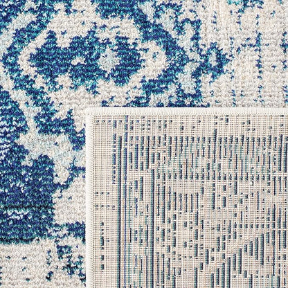SAFAVIEH Monaco Collection Area Rug - 5'1" x 7'7", Ivory & Blue, Boho Chic Medallion Distressed Design, Non-Shedding & Easy Care, Ideal for High Traffic Areas in Living Room, Bedroom (MNC243A)