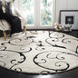 SAFAVIEH Florida Shag Collection Area Rug - 9' Round, Ivory & Black, Scroll Design, Non-Shedding & Easy Care, 1.2-inch Thick Ideal for High Traffic Areas in Living Room, Bedroom (SG455-1290)